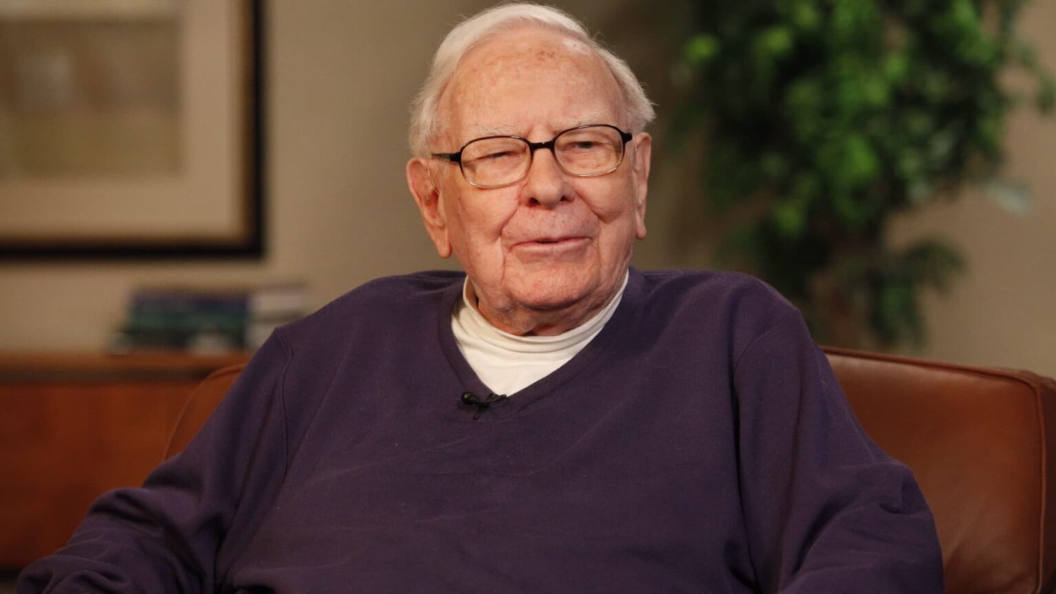 Warren Buffett says he sold Apple too soon and would buy more of it, though not in this market